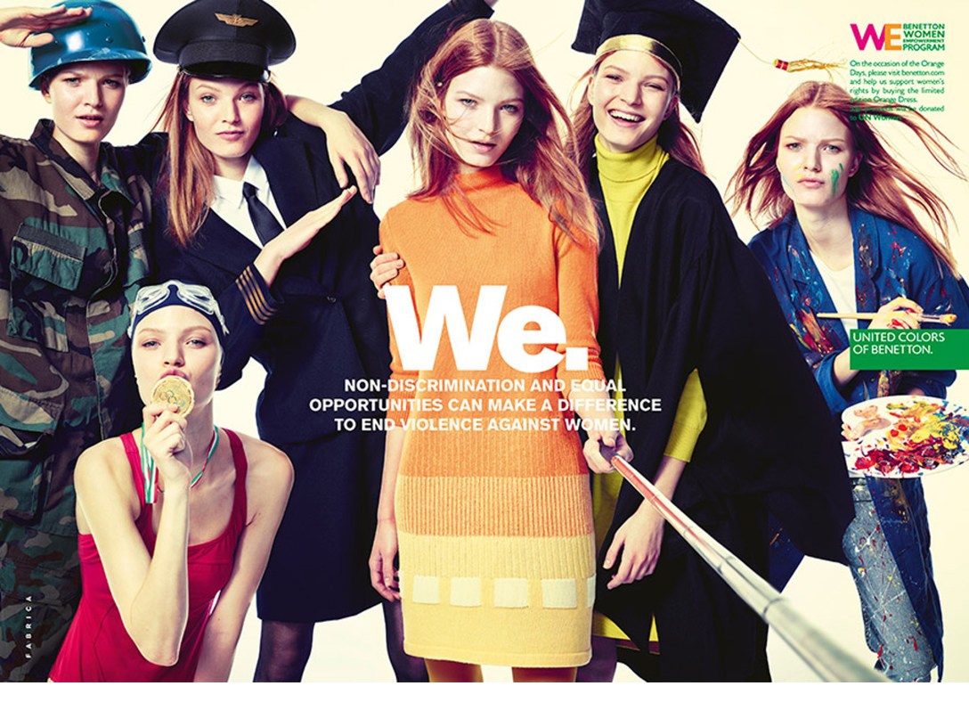 Five women wearing different workwear, women with orange dress in centre