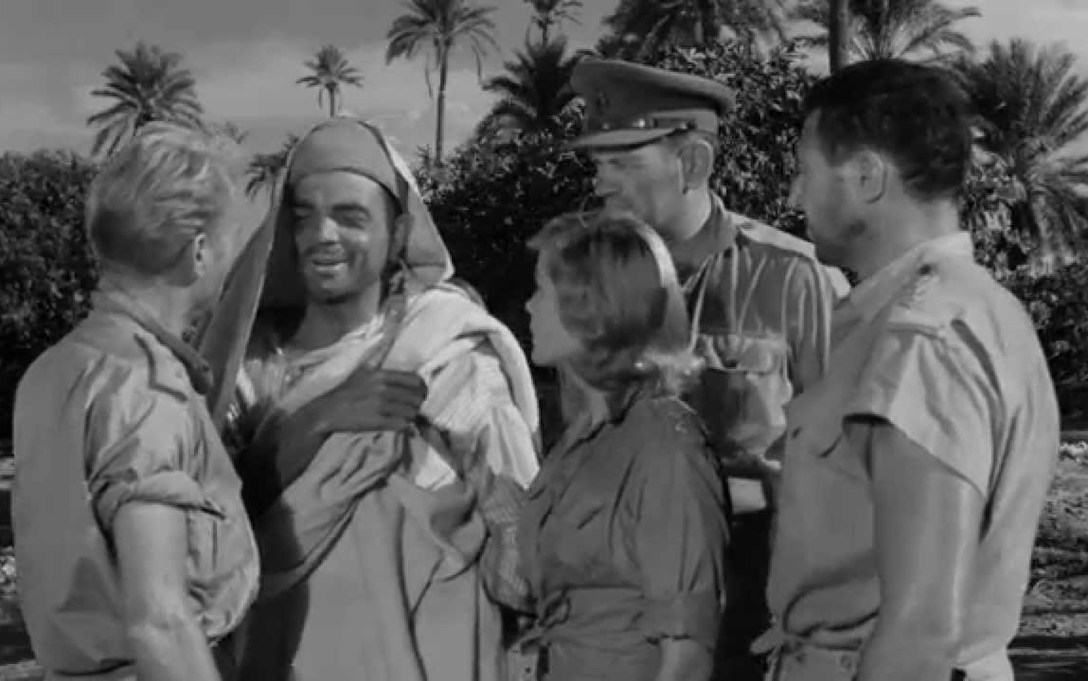 A film still of the cast of Ice Cold in Alex